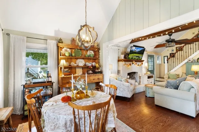 a view of a livingroom with furniture and a chandelier