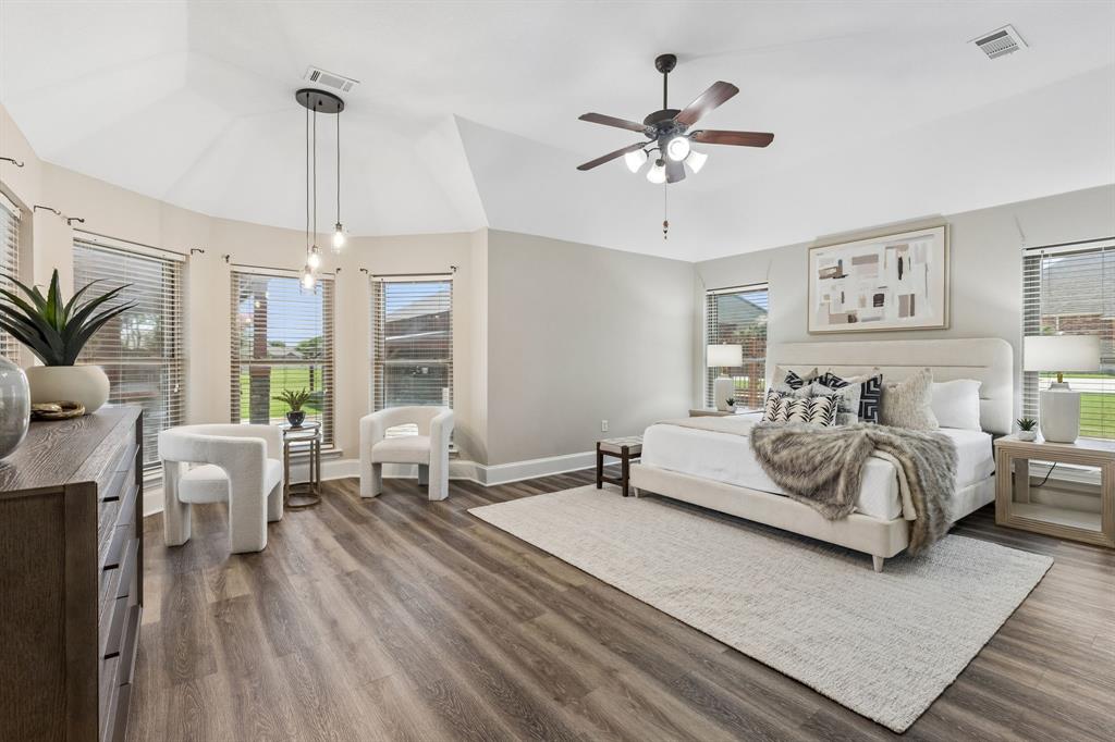 317 Singing Quail Trail Haslet, TX 76052 - Photo 13 of 32 Spacious room featuring wood-finish flooring and a tray ceiling