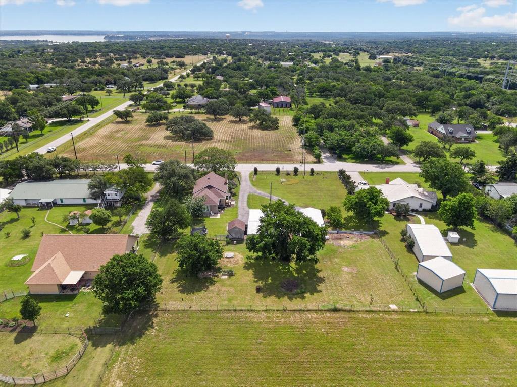 1808 Silver Creek Azle Road Azle, TX 76020 - Photo 30 of 32 an aerial view of residential houses with outdoor space and swimming pool