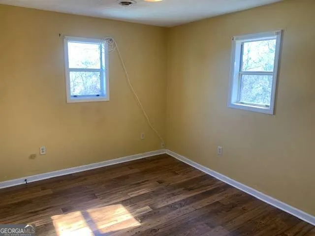 a house view with a garden space