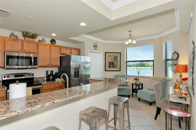 a large kitchen with granite countertop lots of counter top space