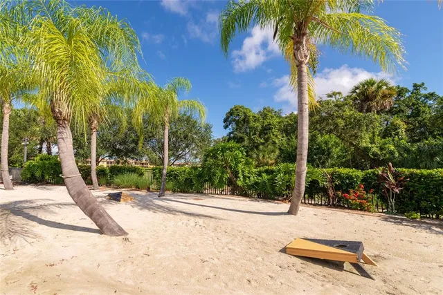 a view of a room with gym equipment and a large window