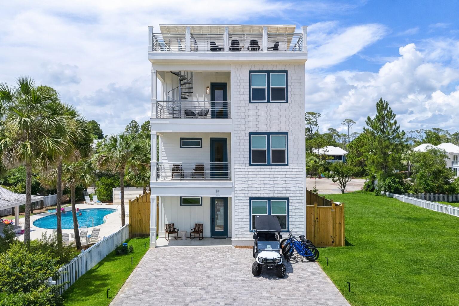 89 Sand Dollar Court Santa Rosa Beach, FL 32459 - Photo 3 of 89 a view of a front of house with a yard