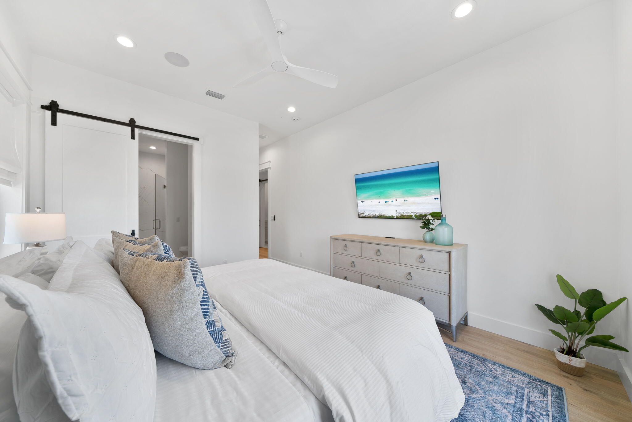 89 Sand Dollar Court Santa Rosa Beach, FL 32459 - Photo 50 of 89 a bedroom with a bed and a flat screen tv