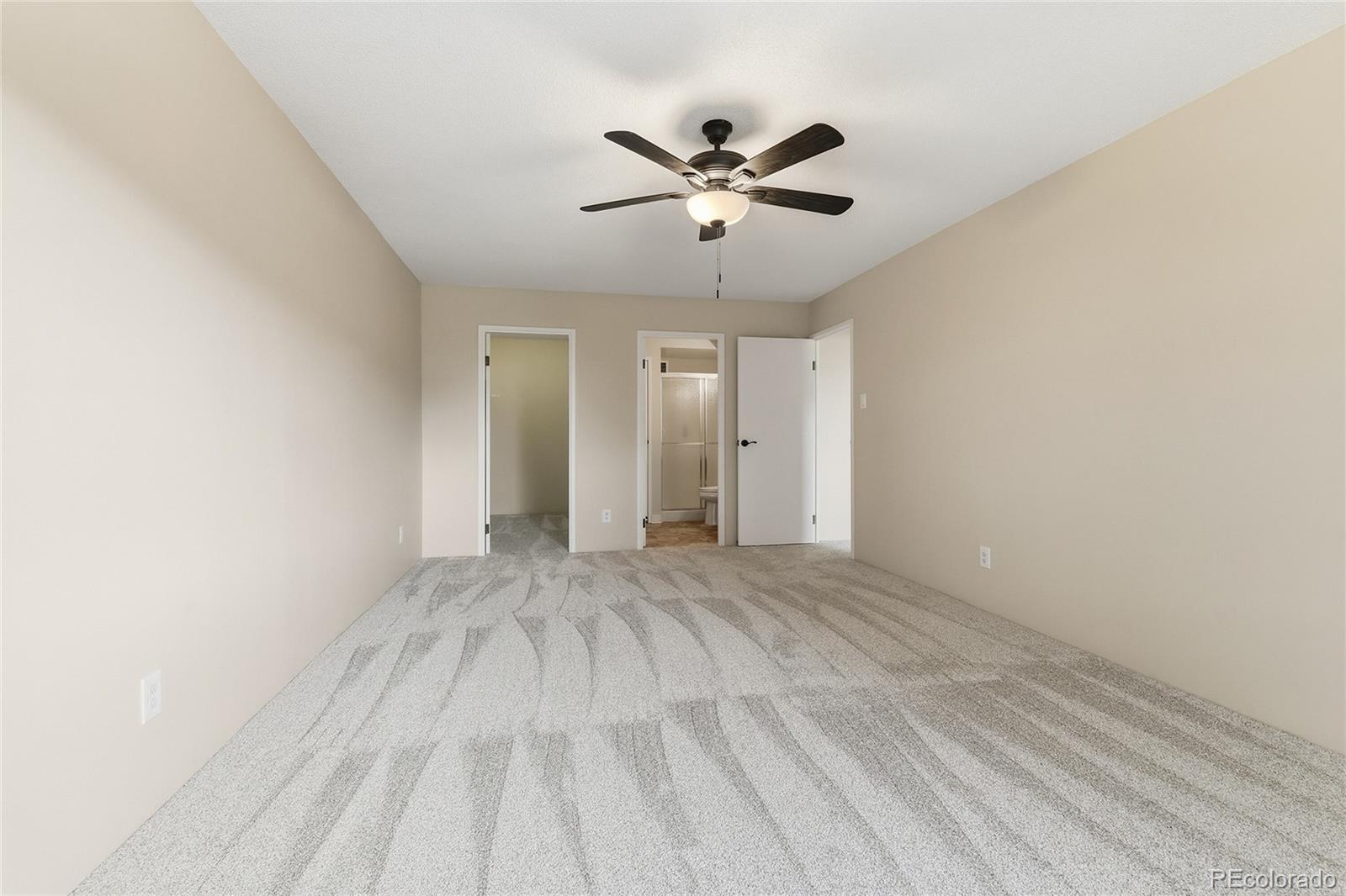 3022 South Wheeling Way, Unit 309 Aurora, CO 80014 - Photo 15 of 26 a view of empty room with wooden floor