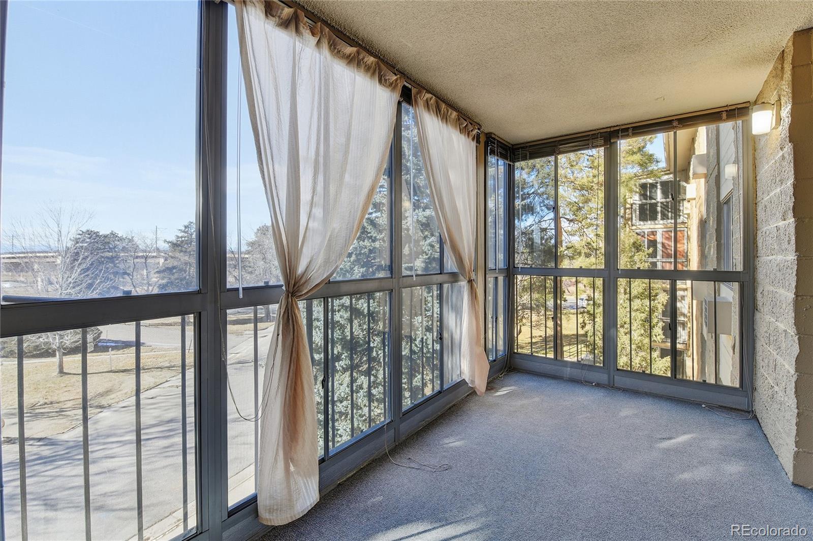 3022 South Wheeling Way, Unit 309 Aurora, CO 80014 - Photo 25 of 26 a view of an entryway with staircase