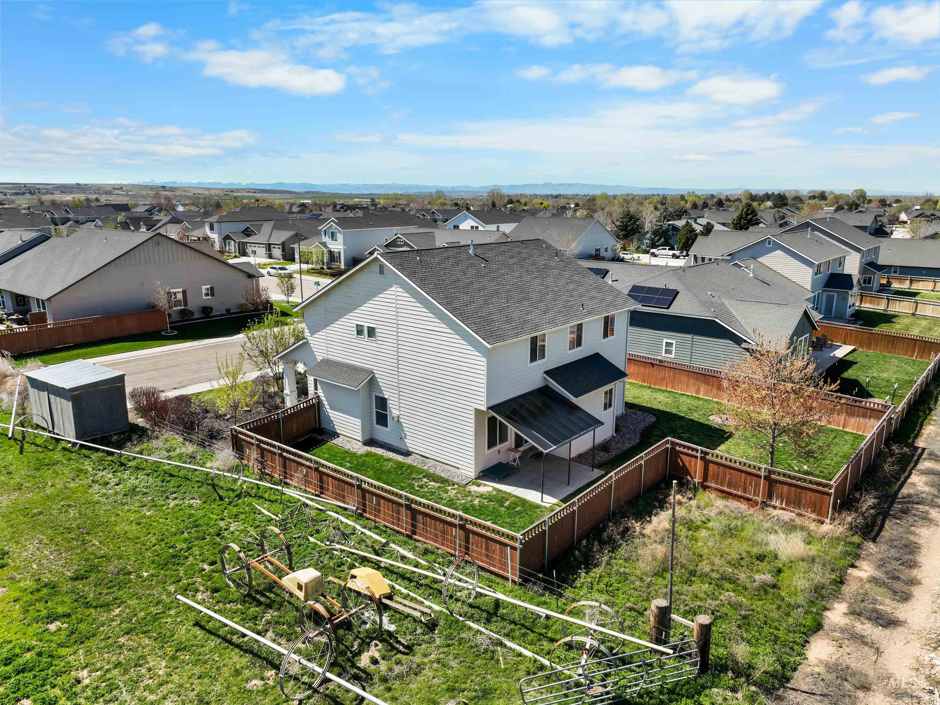 6988 West Spur Street Boise, ID 83709 - Photo 35 of 37 Aerial perspective of suburban area