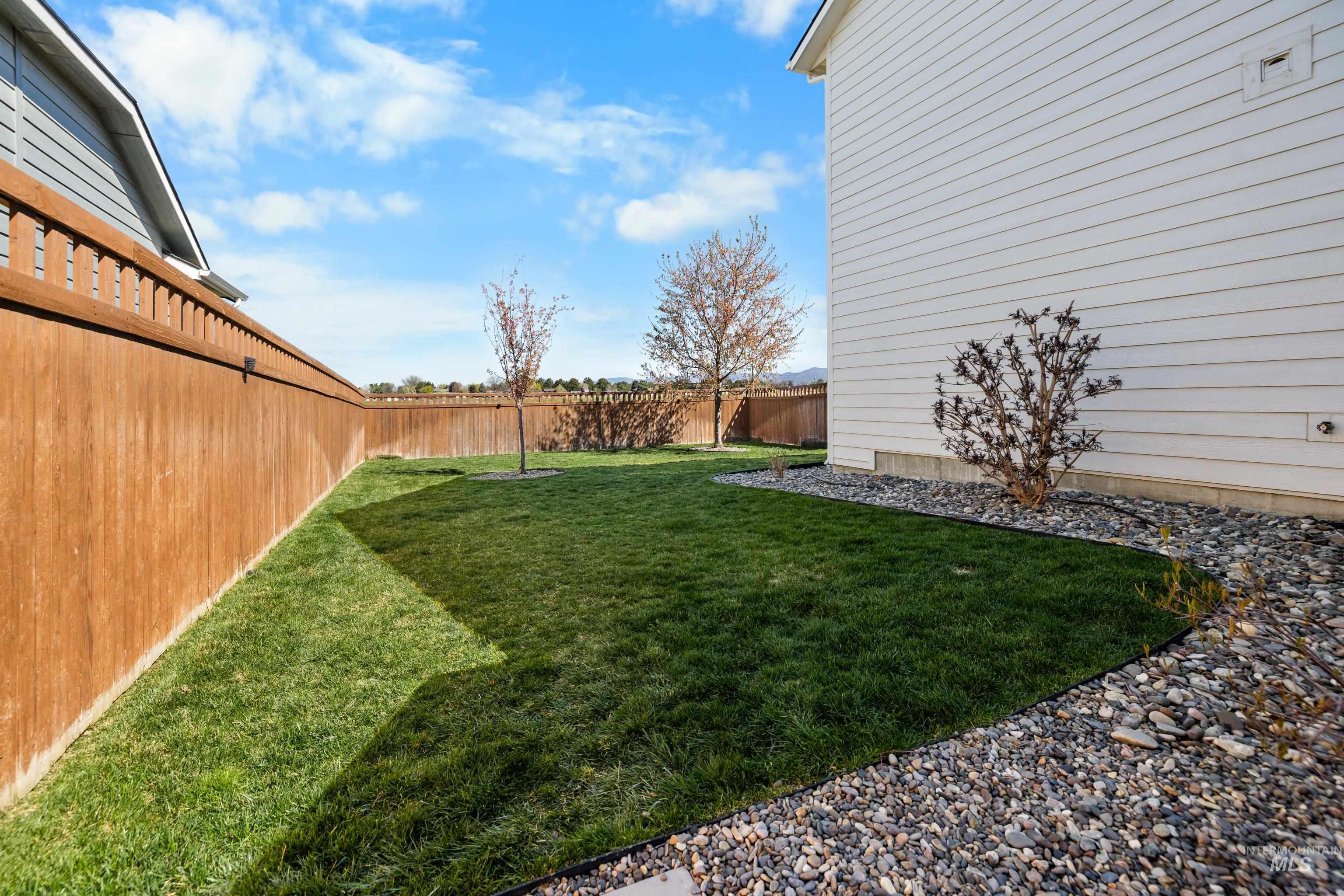 6988 West Spur Street Boise, ID 83709 - Photo 6 of 37 View of fenced backyard