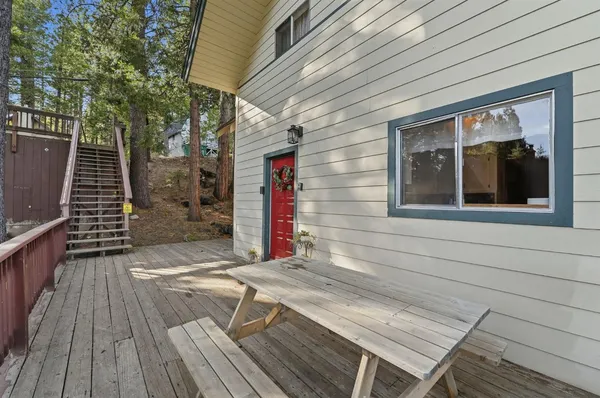 a kitchen with sink cabinets and wooden floor