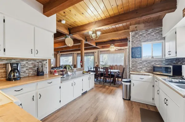 a view of a dining room with furniture