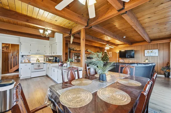 a view of a balcony with wooden floor