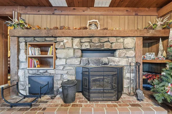 a view of staircase with wooden floor and a potted plant