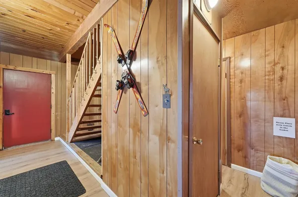 a bedroom with double bed and a window