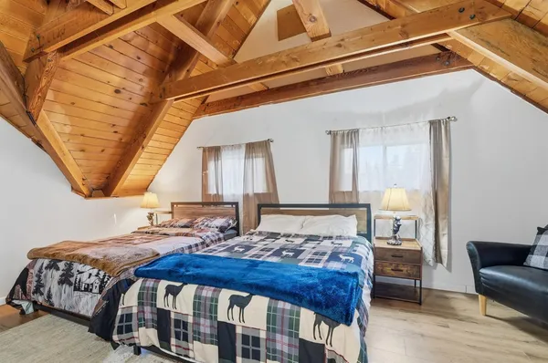 a bathroom with a sink a mirror and a shower curtain