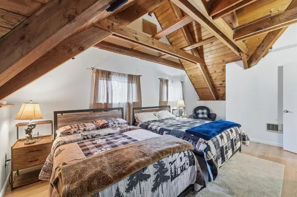 a view of house with a yard