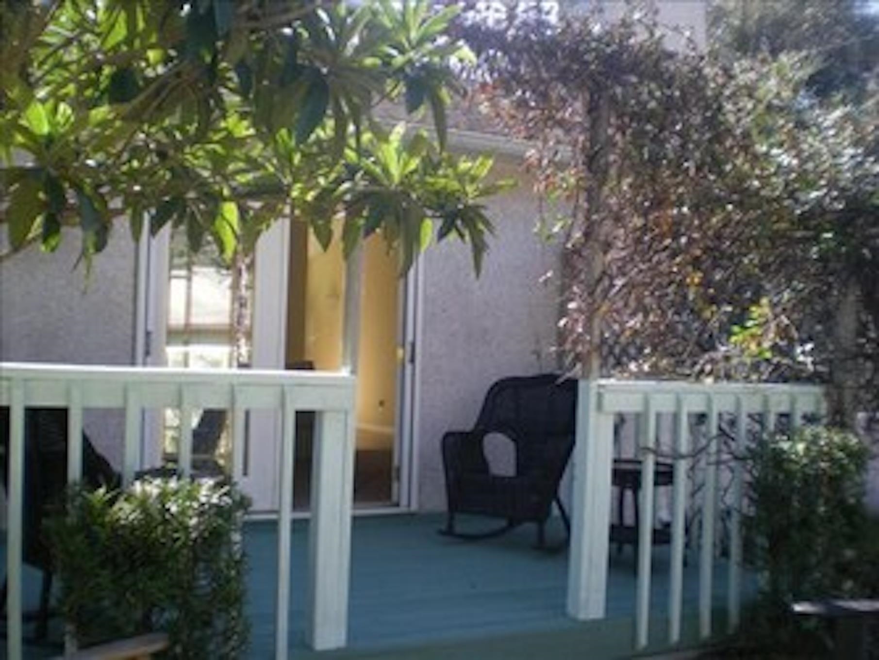 126 13th Street St. Augustine, FL 32080 - Photo 15 of 17 a house view with a garden space