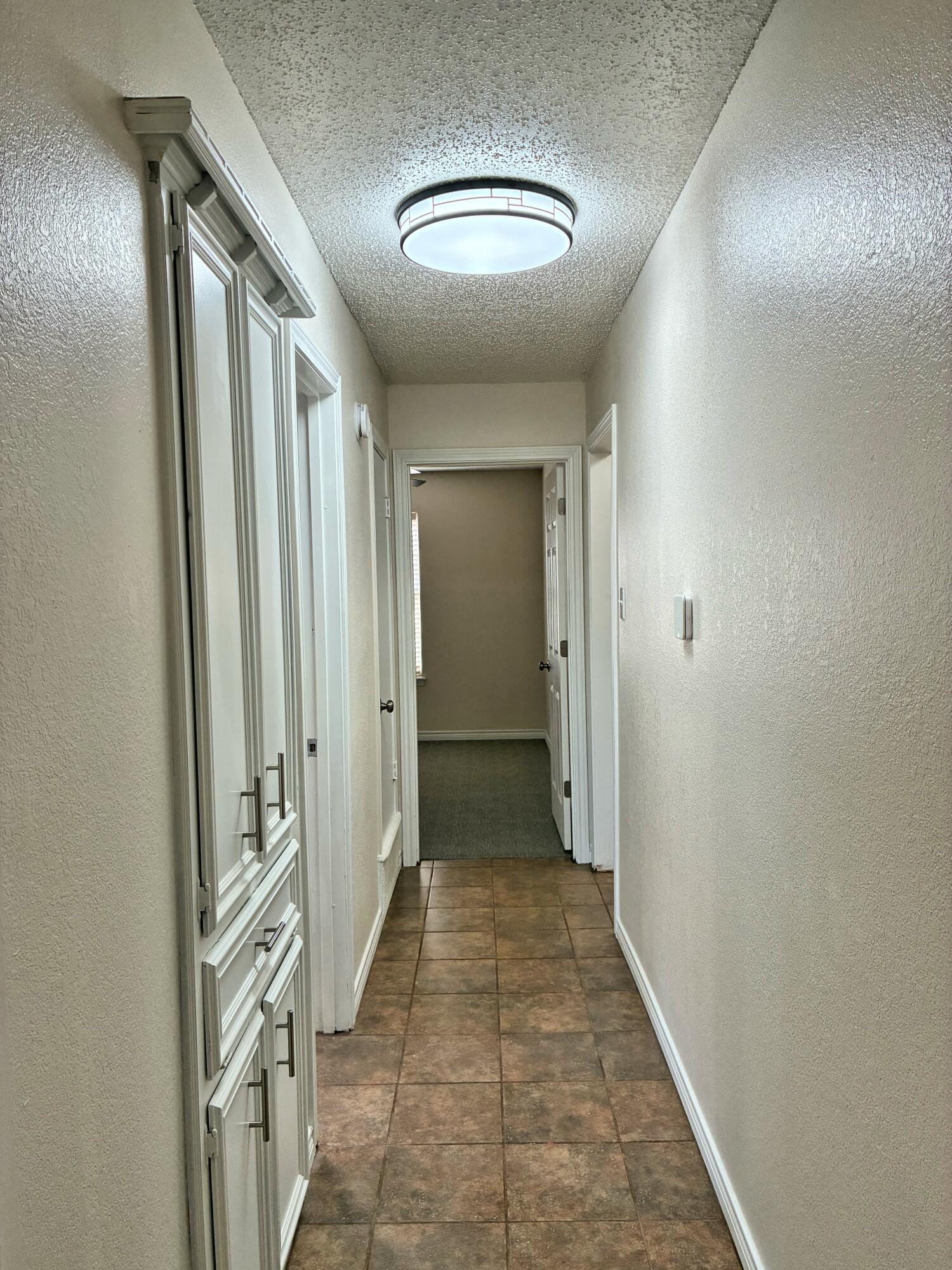 4904 64th Street Lubbock, TX 79414 - Photo 27 of 49 Hallway Between Bedroom 2 and 3