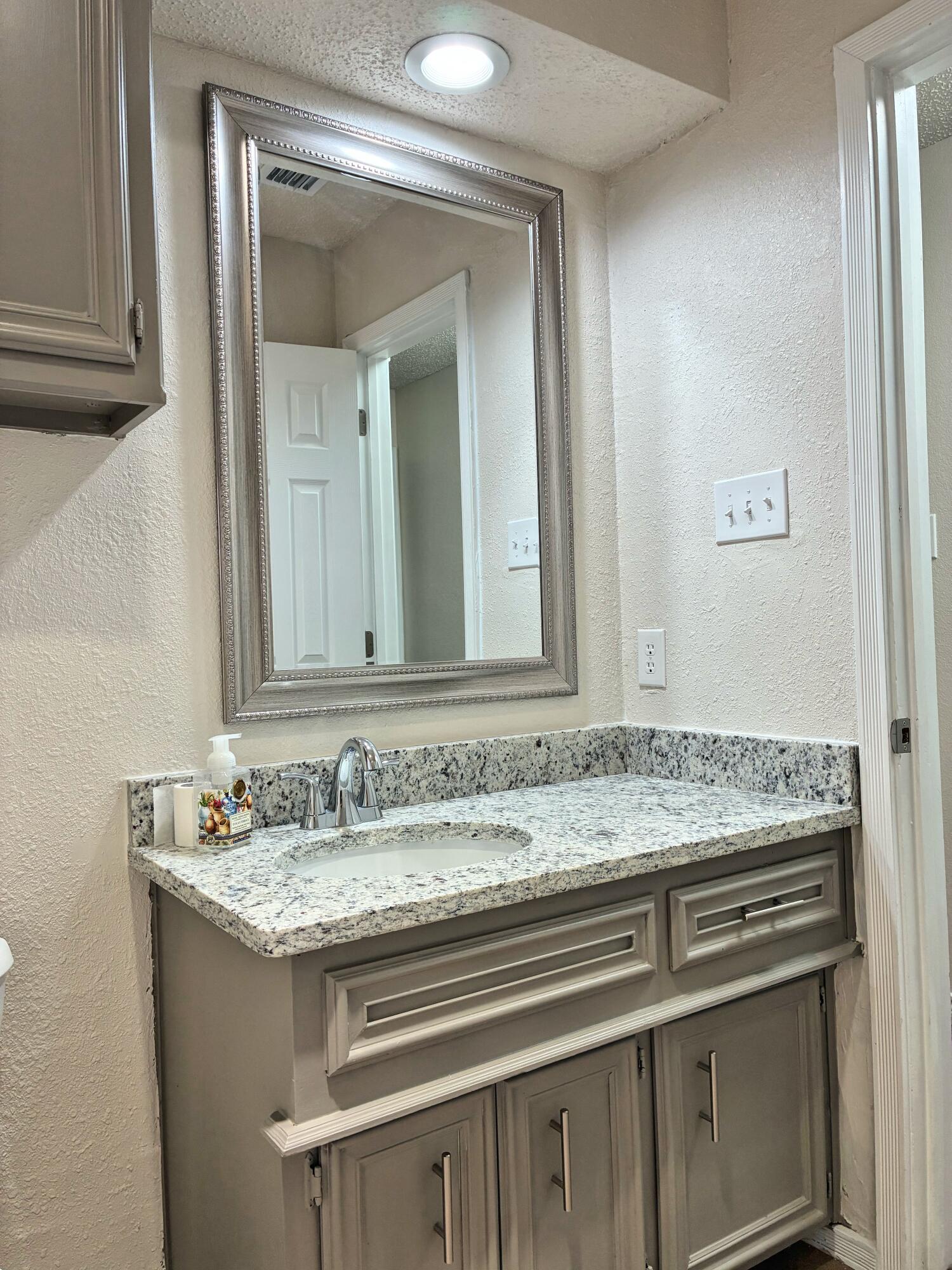 4904 64th Street Lubbock, TX 79414 - Photo 35 of 49 4904 64th Street Hall Bath