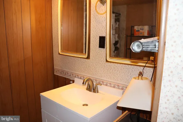 a swimming pool view with a lake view