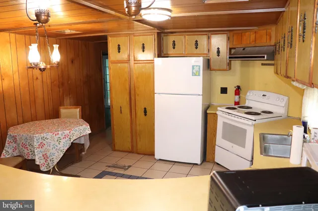 a bedroom with a bed and a cabinets