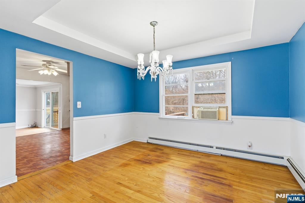 229 Edwards Road Parsippany, NJ 07054 - Photo 15 of 34 a view of a room with window and chandelier