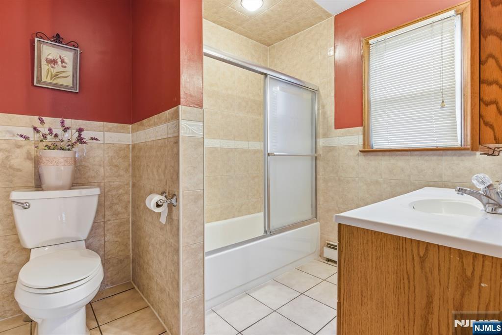 229 Edwards Road Parsippany, NJ 07054 - Photo 24 of 34 a bathroom with a sink and a toilet