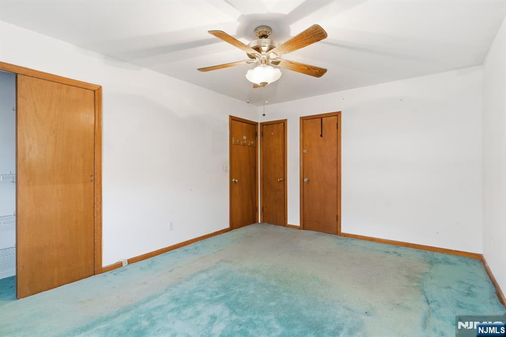 229 Edwards Road Parsippany, NJ 07054 - Photo 26 of 34 a view of an empty room with a ceiling fan
