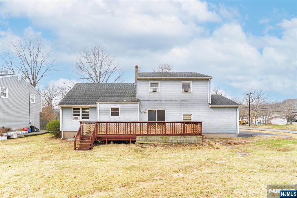 229 Edwards Road Parsippany, NJ 07054 - Photo 7 of 34 a view of a house with swimming pool and sitting area