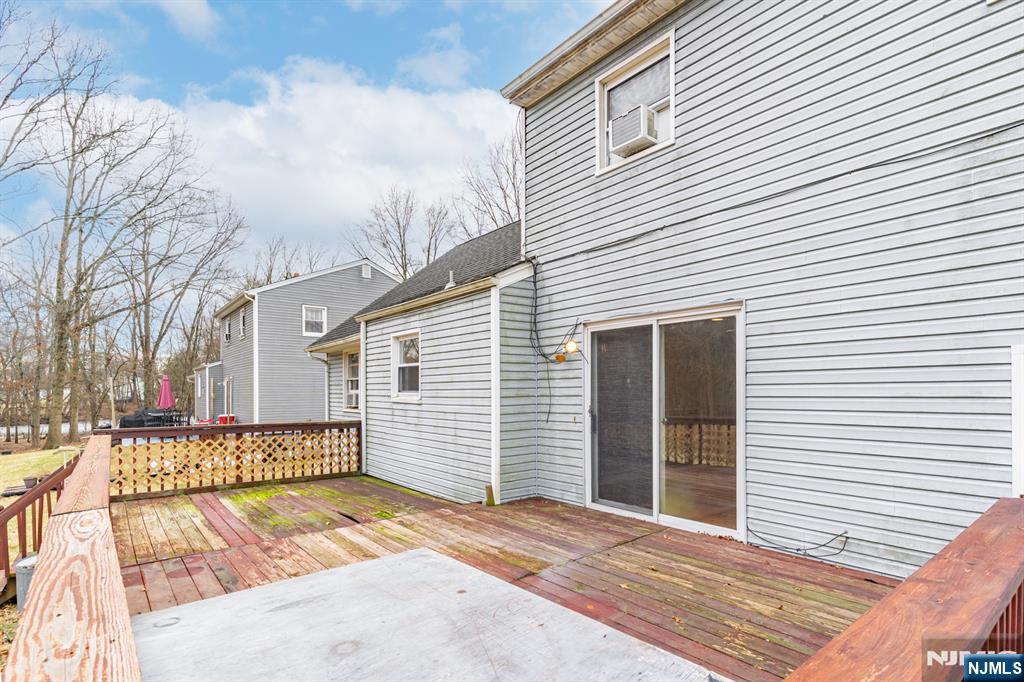 229 Edwards Road Parsippany, NJ 07054 - Photo 9 of 34 a view of a house with a patio