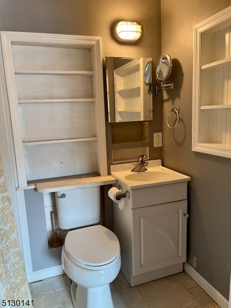 67 Rt 645 Layton, NJ 07851 - Photo 11 of 16 a bathroom with a sink and a toilet