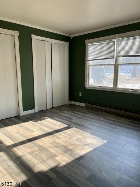 67 Rt 645 Layton, NJ 07851 - Photo 12 of 16 a view of an empty room with wooden floor and a window