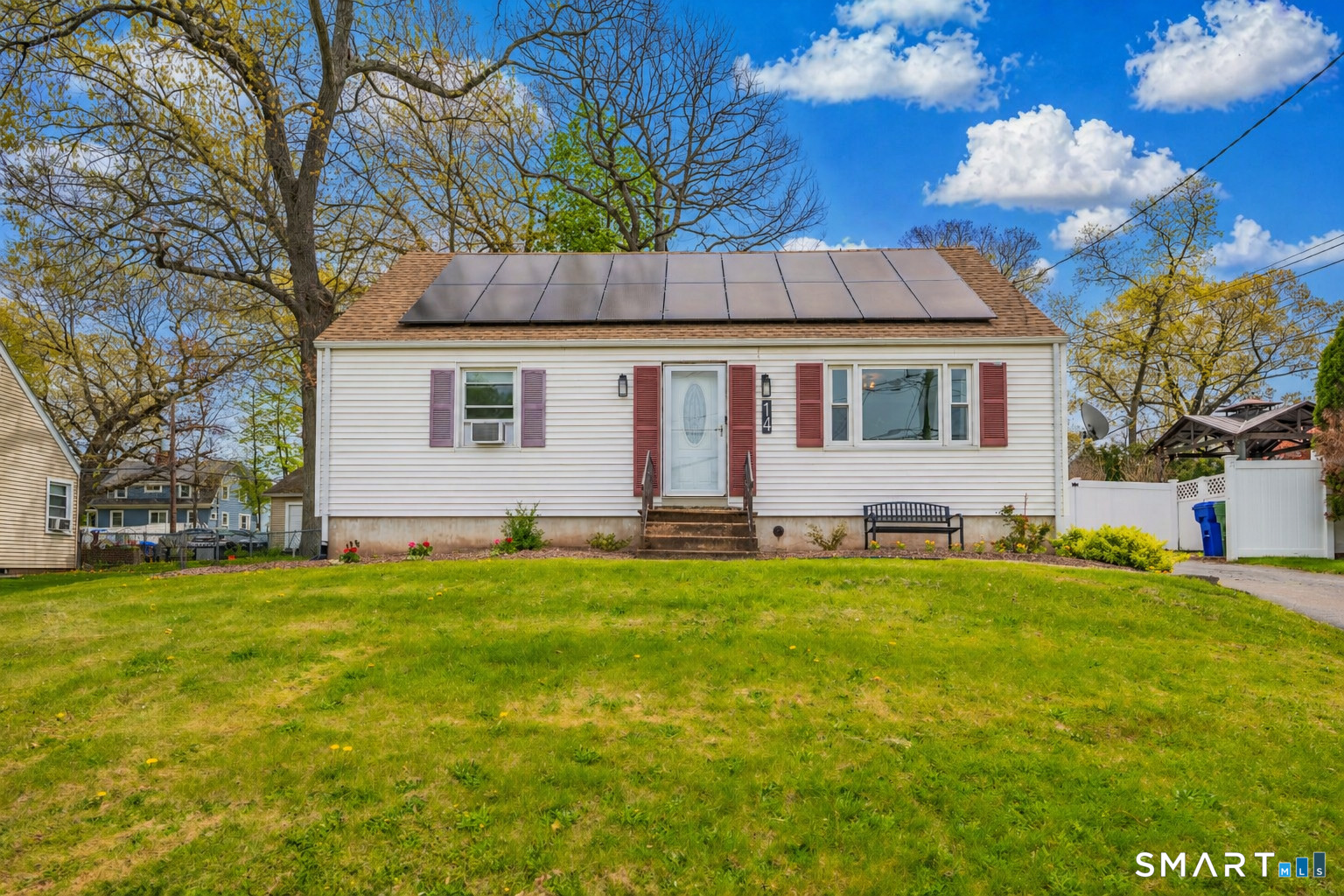 14 Baldwin Street Meriden, CT 06451 - Photo 1 of 35 a view of a house with a yard