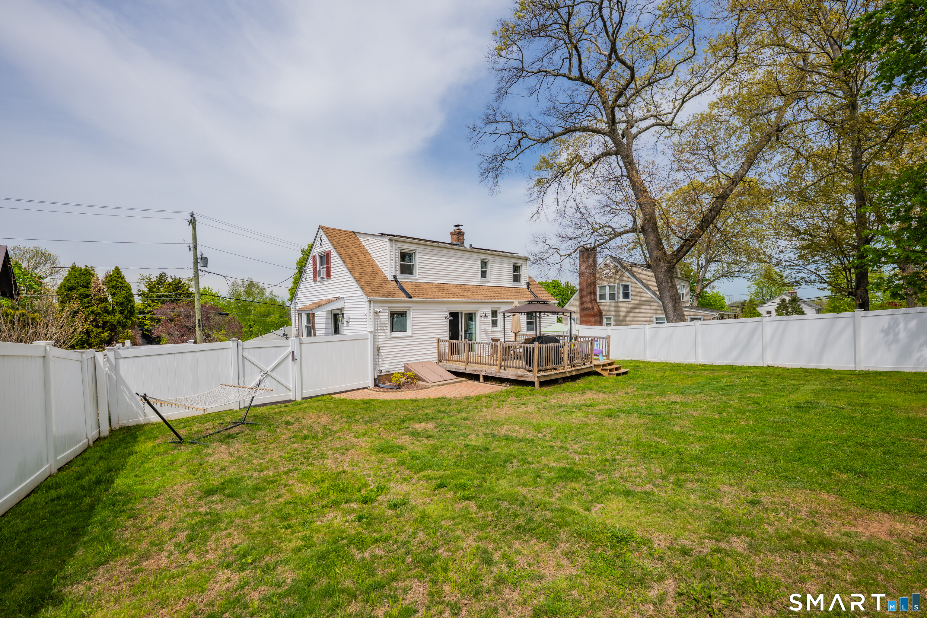 14 Baldwin Street Meriden, CT 06451 - Photo 27 of 35 a view of a house with a yard and sitting area
