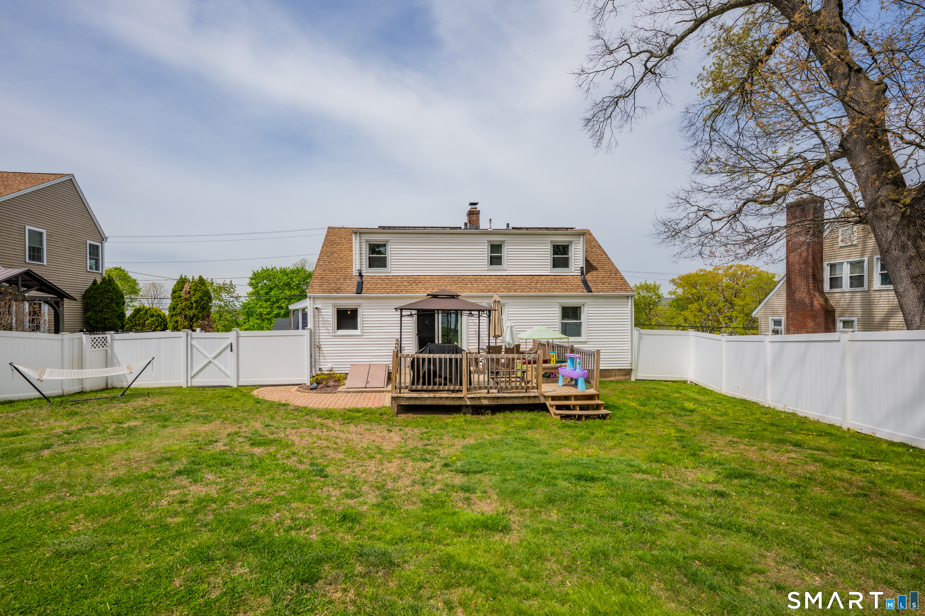 14 Baldwin Street Meriden, CT 06451 - Photo 28 of 35 a view of a house with a yard and sitting area