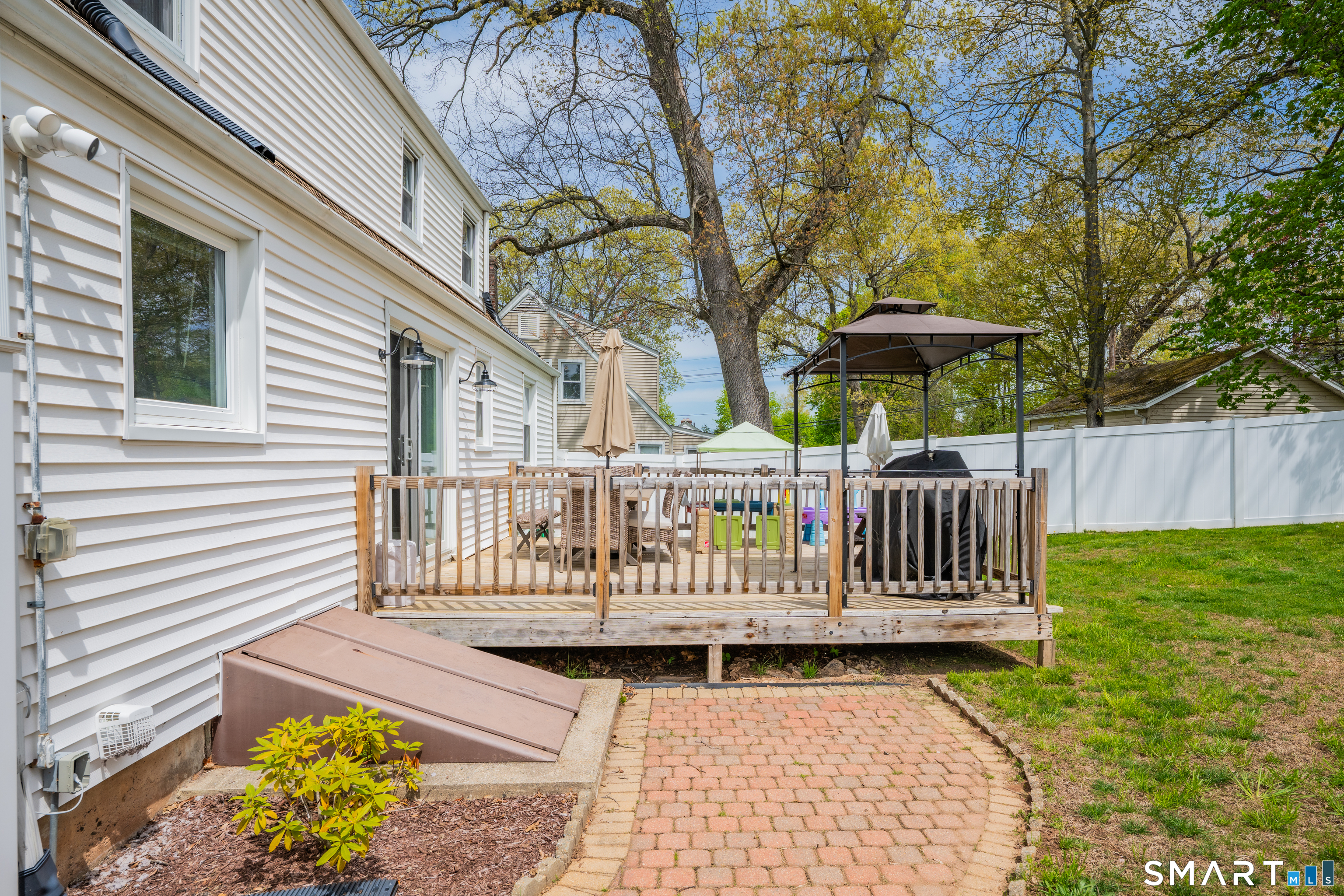 14 Baldwin Street Meriden, CT 06451 - Photo 30 of 35 a view of a bench in patio