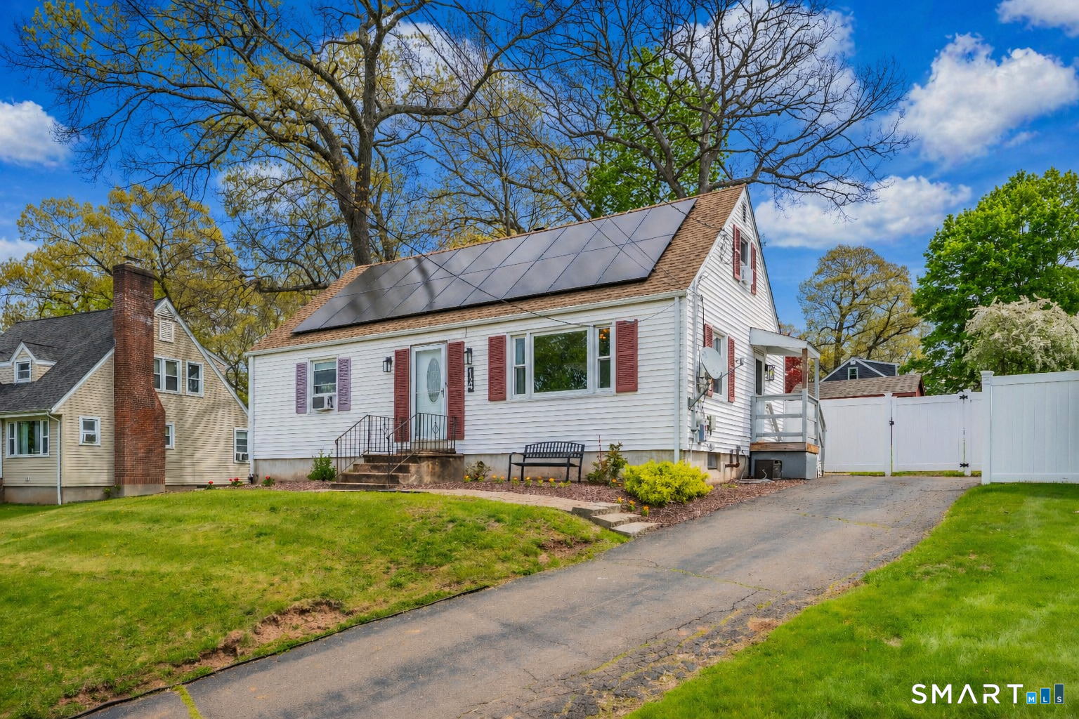 14 Baldwin Street Meriden, CT 06451 - Photo 4 of 35 a front view of house with yard and green space