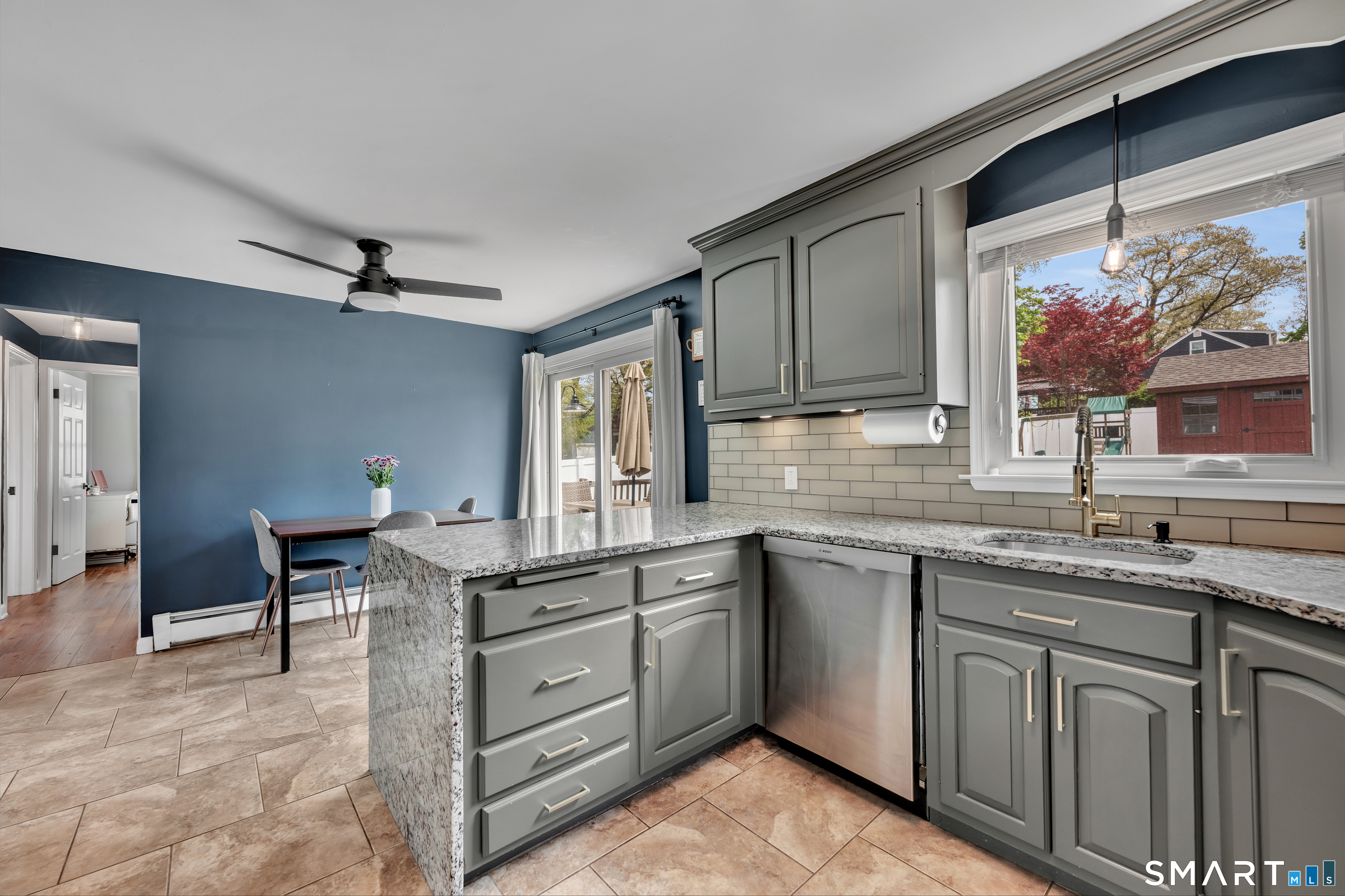 14 Baldwin Street Meriden, CT 06451 - Photo 8 of 35 a kitchen with a sink cabinets and window