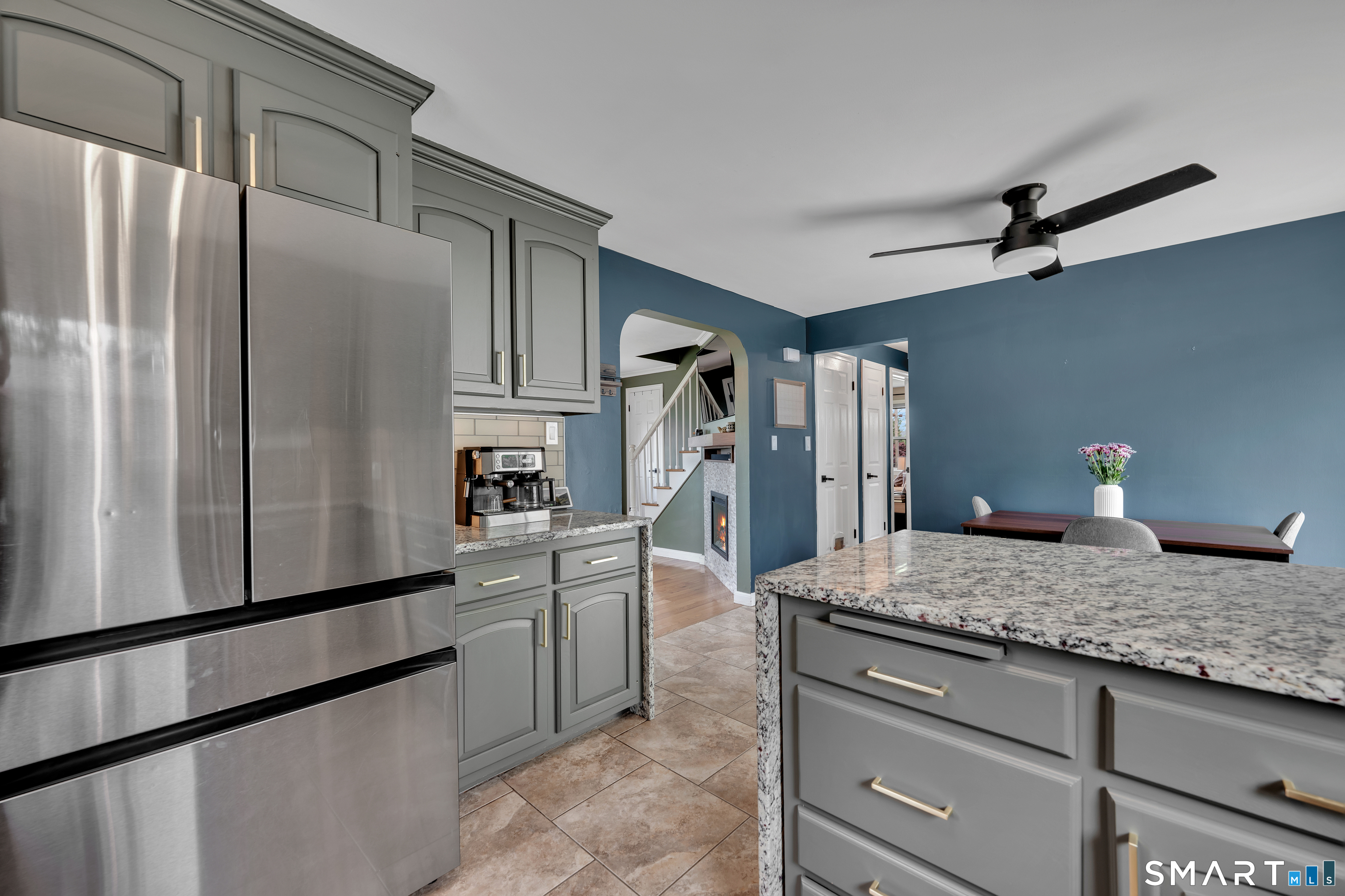 14 Baldwin Street Meriden, CT 06451 - Photo 9 of 35 a kitchen with granite countertop a refrigerator and a sink