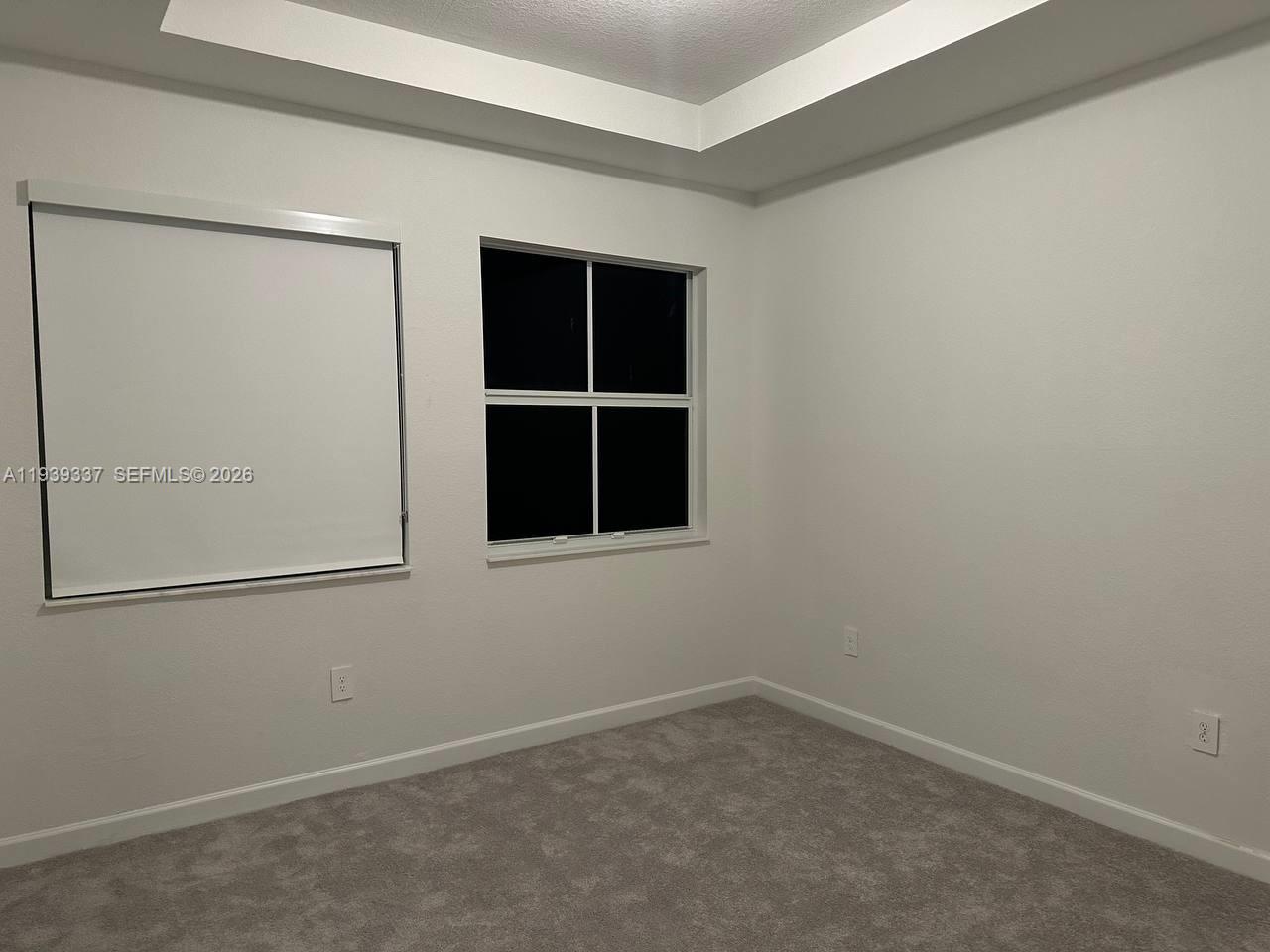 14816 Southwest 265th Street Homestead, FL 33032 - Photo 15 of 16 an empty room with a empty space