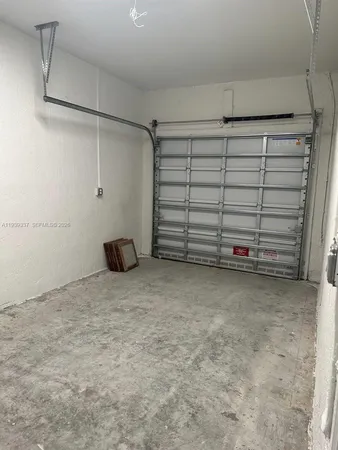 an empty room with a bathroom