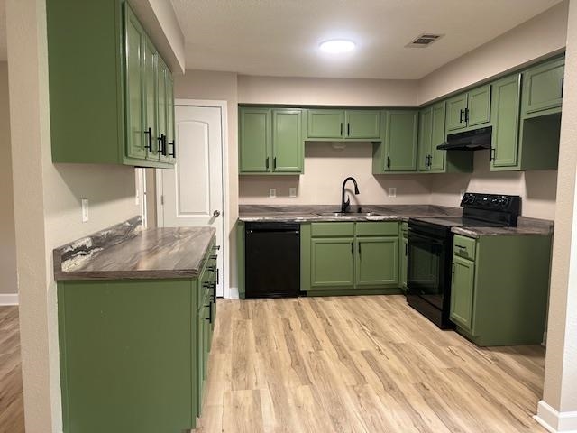 15 Brookwood Loop Adamsville, TN 38310 - Photo 2 of 21 a kitchen with a sink and cabinets