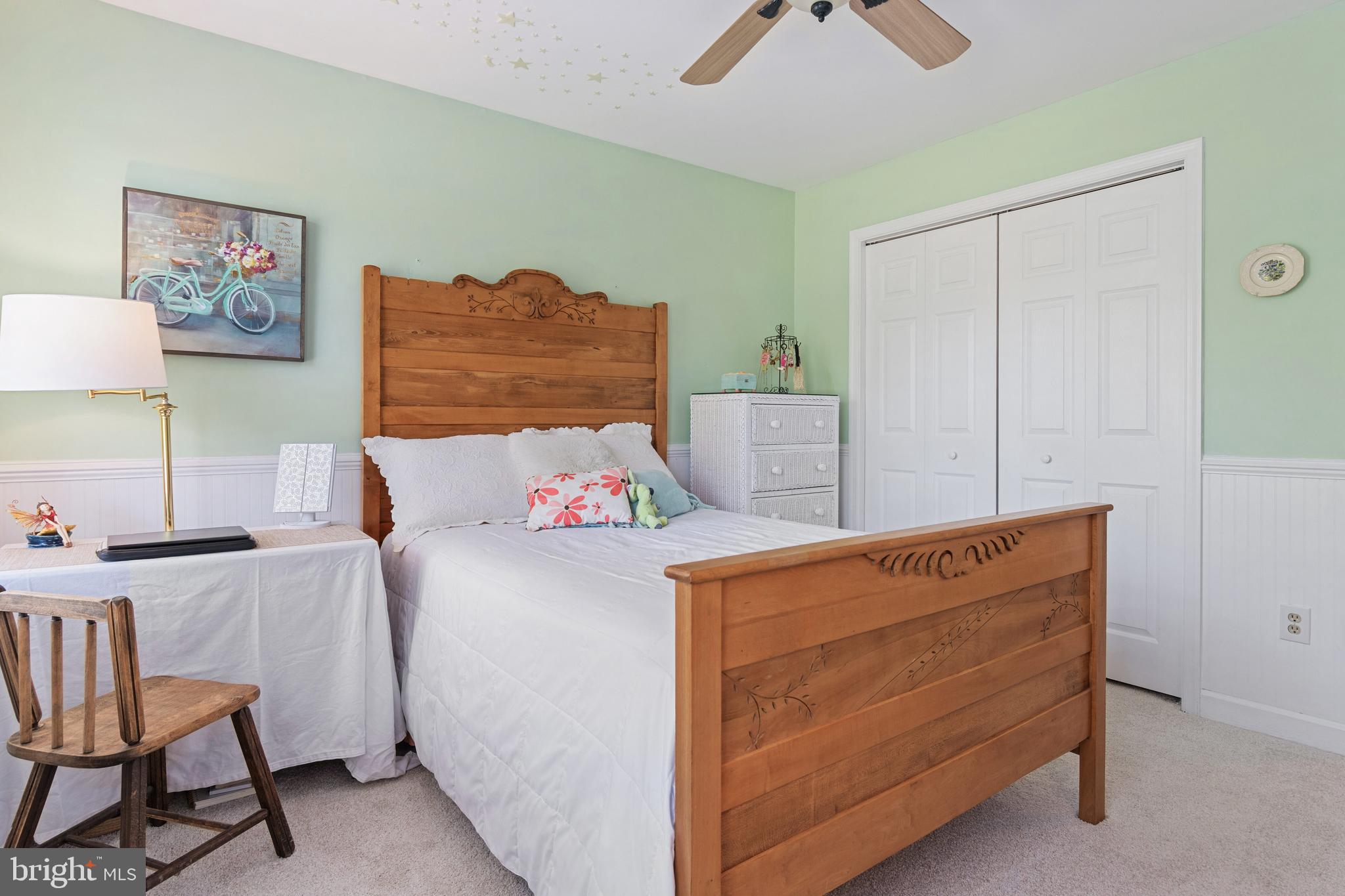 2861 Cox Neck Road Chester, MD 21619 - Photo 44 of 79 a bed room with a bed and a chair