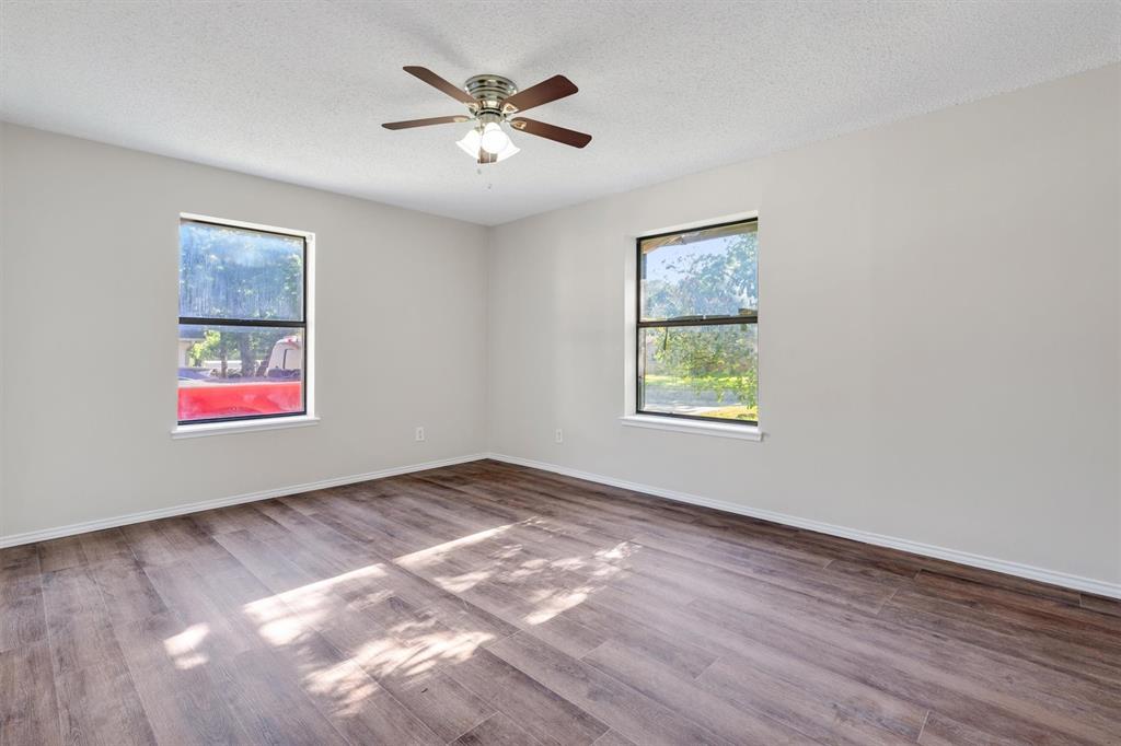 209 Mistletoe Lane Keene, TX 76059 - Photo 31 of 38 a view of an empty room with a window