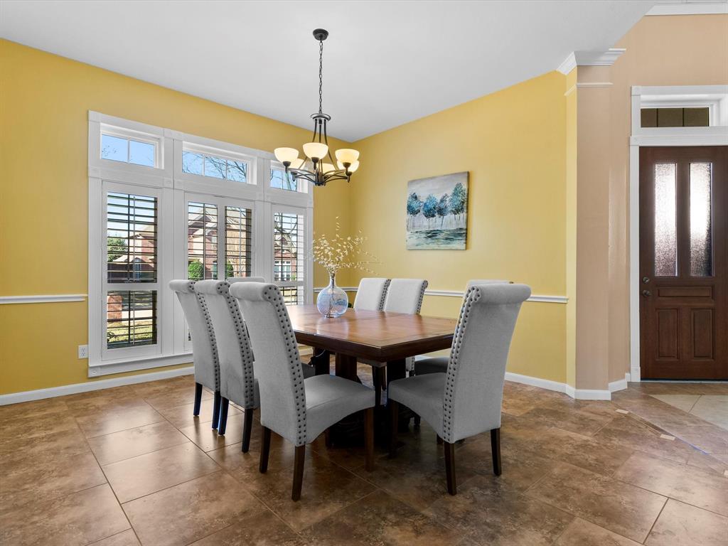 728 Morningside Trail Murphy, TX 75094 - Photo 13 of 40 a view of a dining room with furniture and window