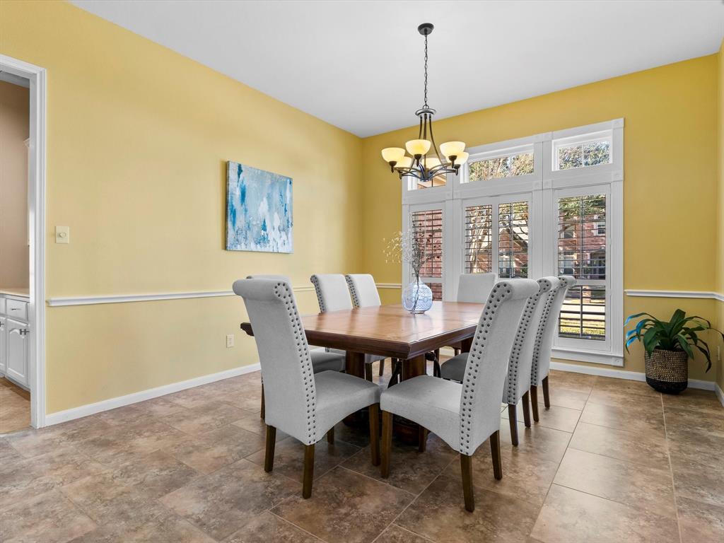 728 Morningside Trail Murphy, TX 75094 - Photo 14 of 40 a view of a dining room with furniture and window