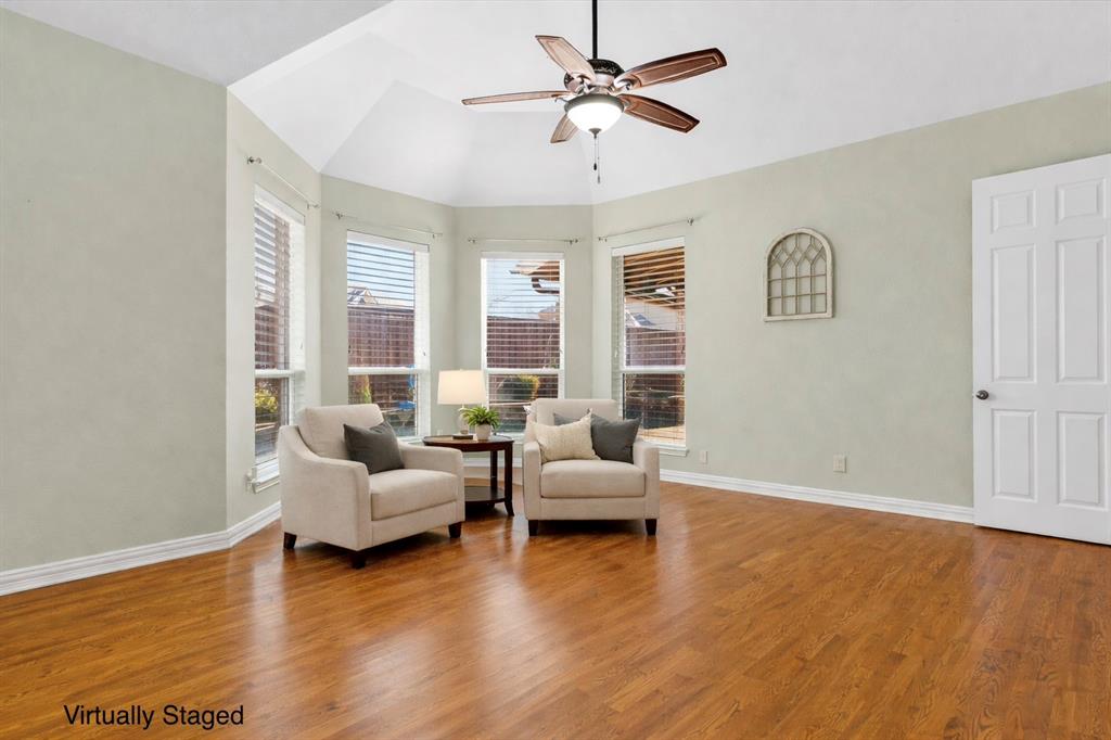 728 Morningside Trail Murphy, TX 75094 - Photo 16 of 40 a living room with couches and a coffee table