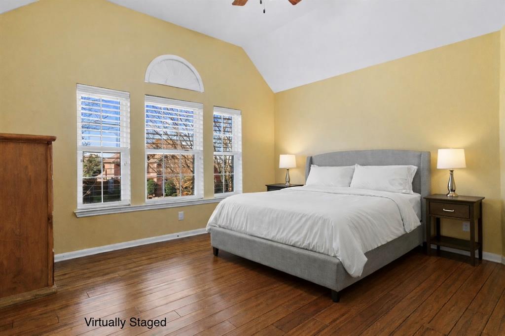 728 Morningside Trail Murphy, TX 75094 - Photo 22 of 40 a bedroom with a bed and a large window