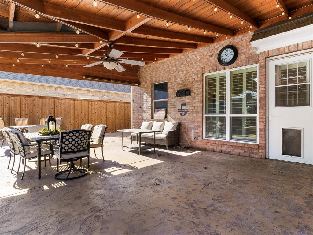 728 Morningside Trail Murphy, TX 75094 - Photo 27 of 40 a view of a patio with table and chairs