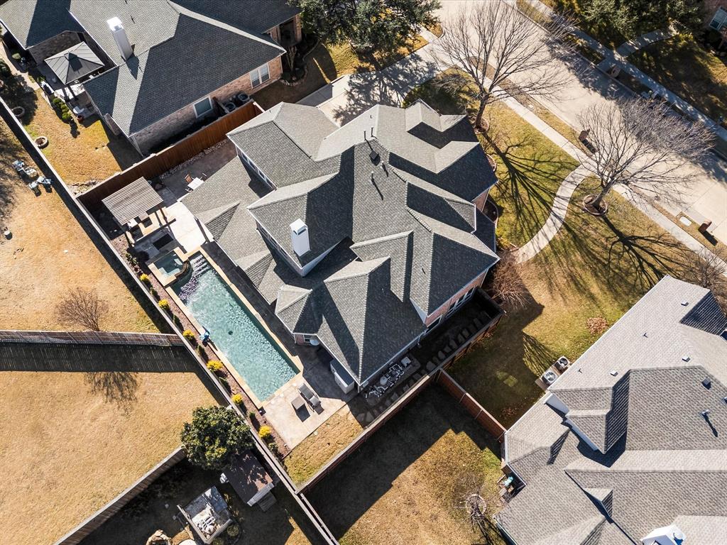 728 Morningside Trail Murphy, TX 75094 - Photo 35 of 40 a view of a patio with a bed