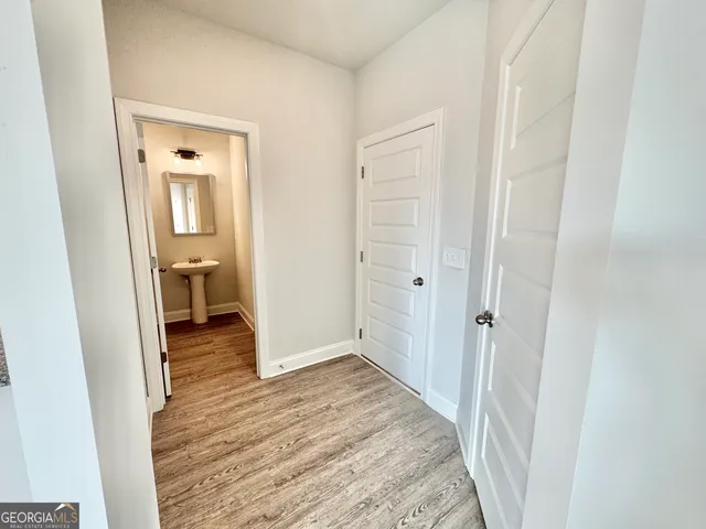 a view of entryway with wooden floor